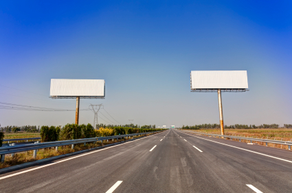 Стоковая фотография 22443209 асфальтированное шоссе с рекламным щитом