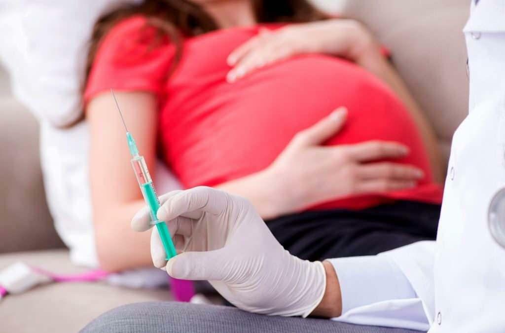 На каких месяцах беременности следует делать прививку от гриппа?