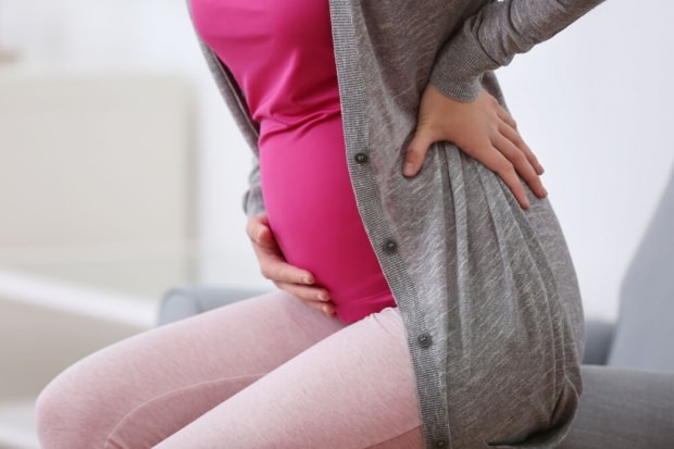 Боль в пояснице во время беременности