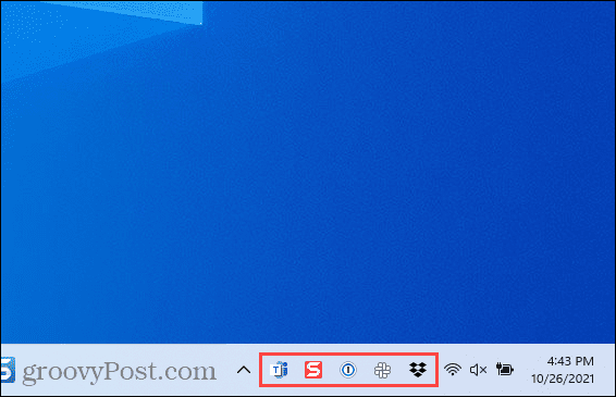 Значки переполнения углов панели задач в Windows 11