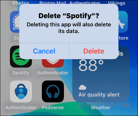 Удалить приложение Spotify на iPhone
