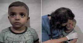Так врач пытался успокоить палестинского ребенка, который трясся от страха во время израильской атаки