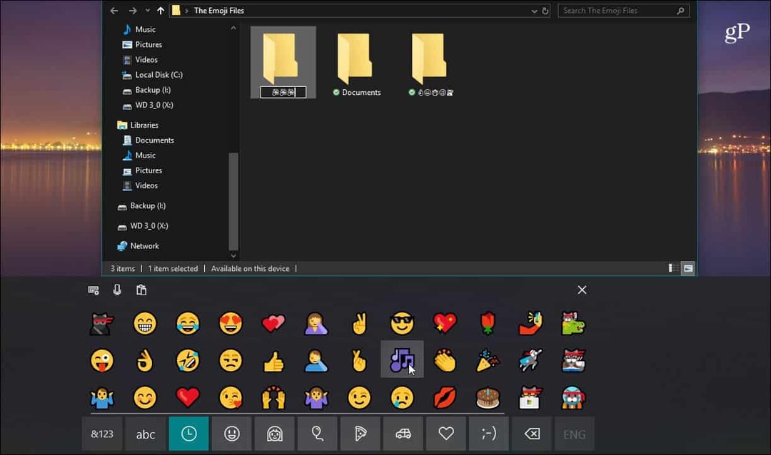 Сенсорная клавиатура Emoji File Explorer